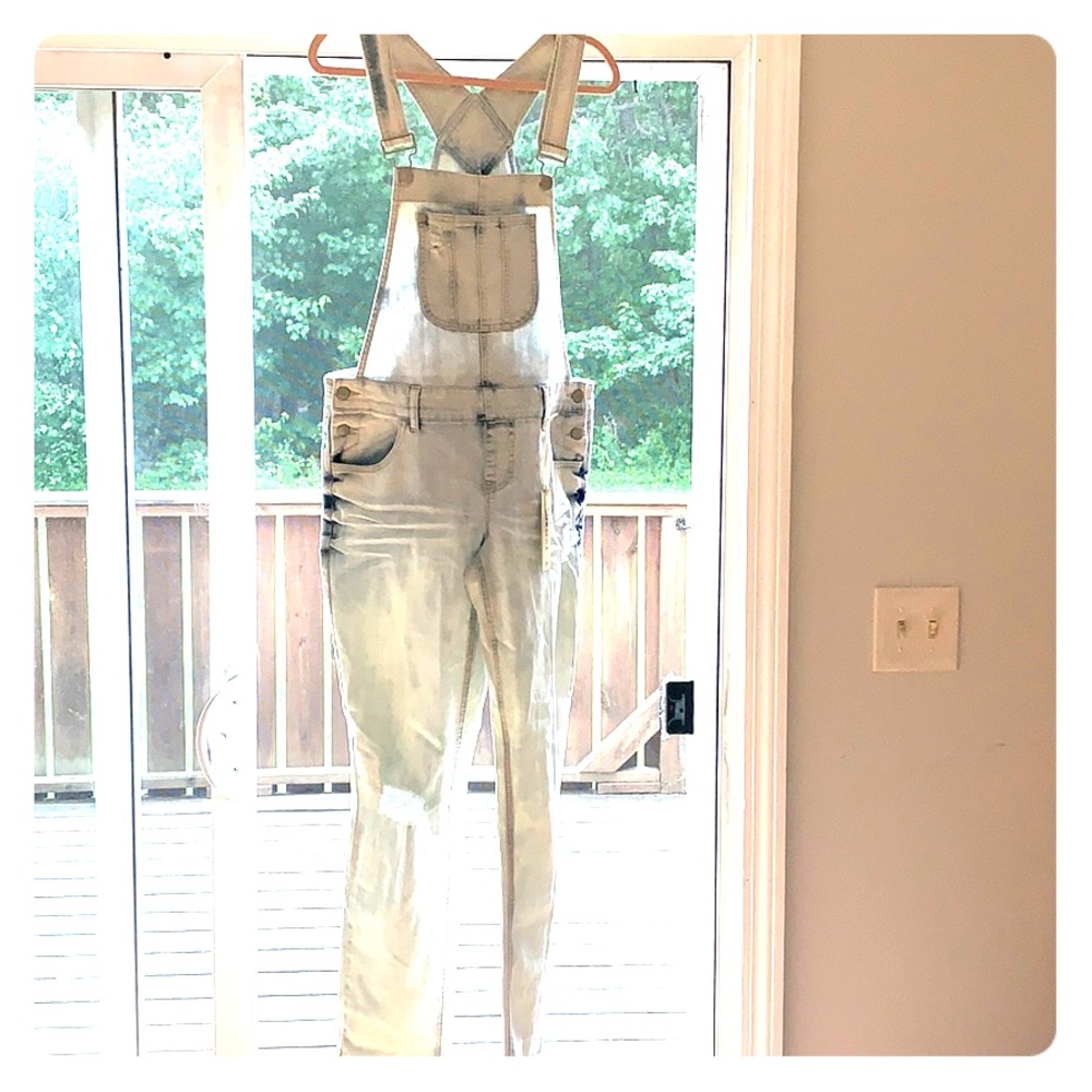 Distressed overalls light wash